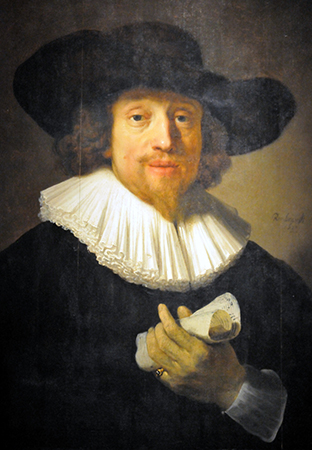 Man with Sheet of Music ​ Circle of Rembrandt van Rijn 